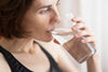 Woman drinking a glass of water