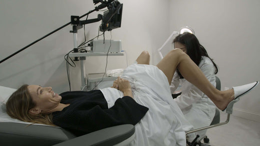 a woman receiving a doctor exam