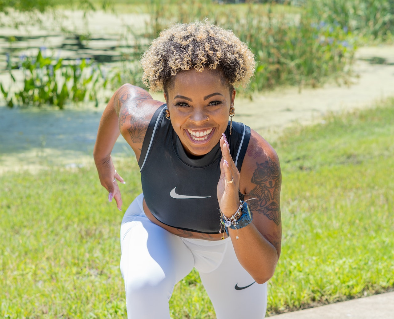 Woman smiling while running outdoors