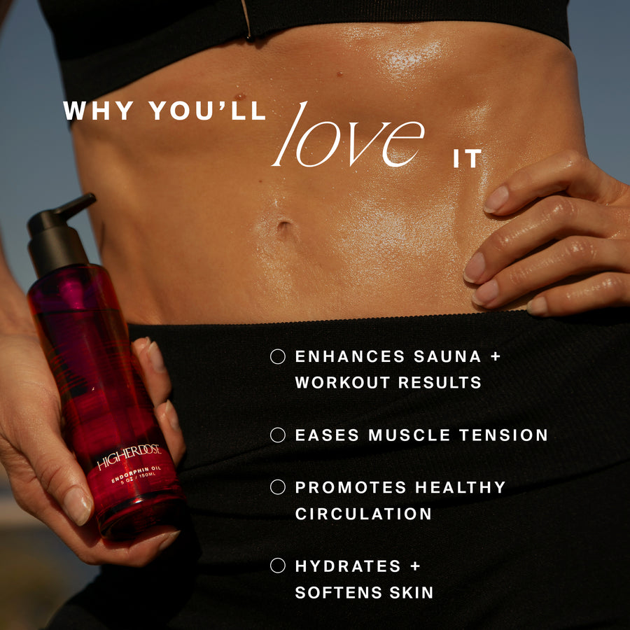 Red oil in pump bottle held next to glistening skin on torso.