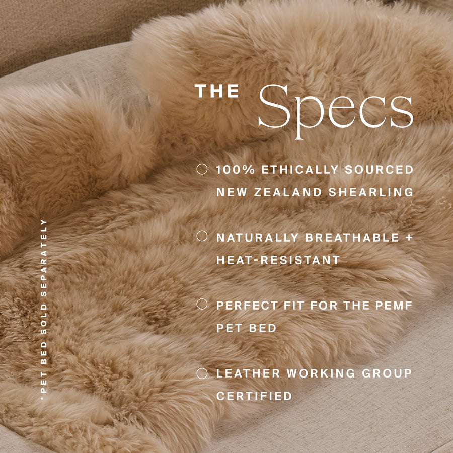 Tan shearling pet bed cover with thick, fluffy wool pile on a neutral fabric base.