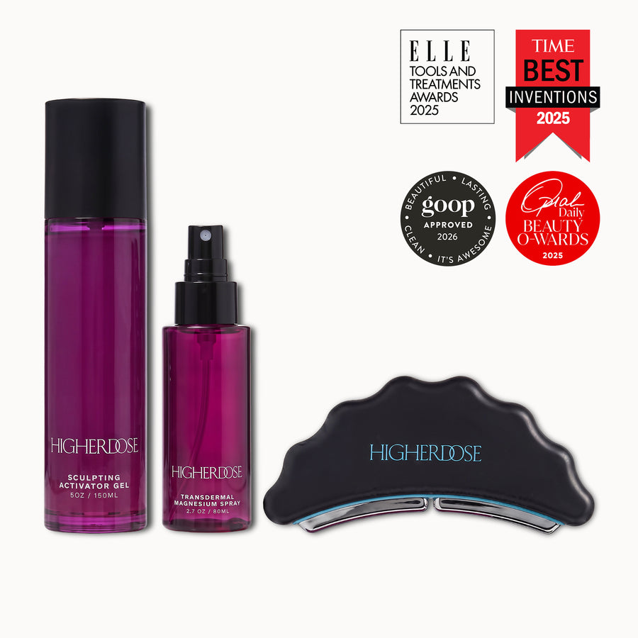Black microcurrent body sculptor device with two purple gel bottles labeled Sculpting Activator Gel and Transdermal Magnesium