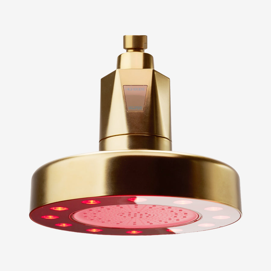 Gold showerhead with red LED lights around the perimeter and pink spray nozzle face.