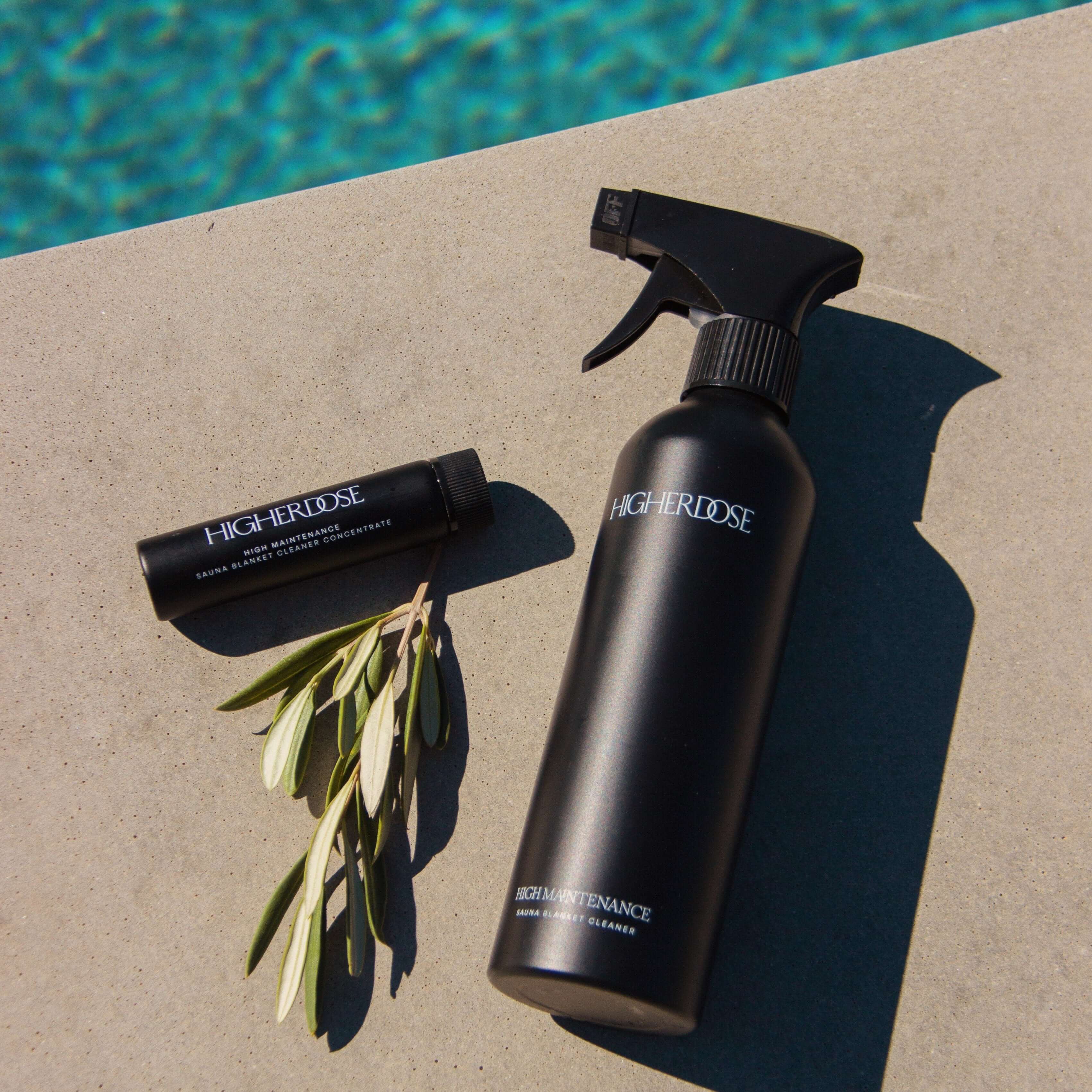 A black bottle of HigherDOSE High Maintenance Cleaner